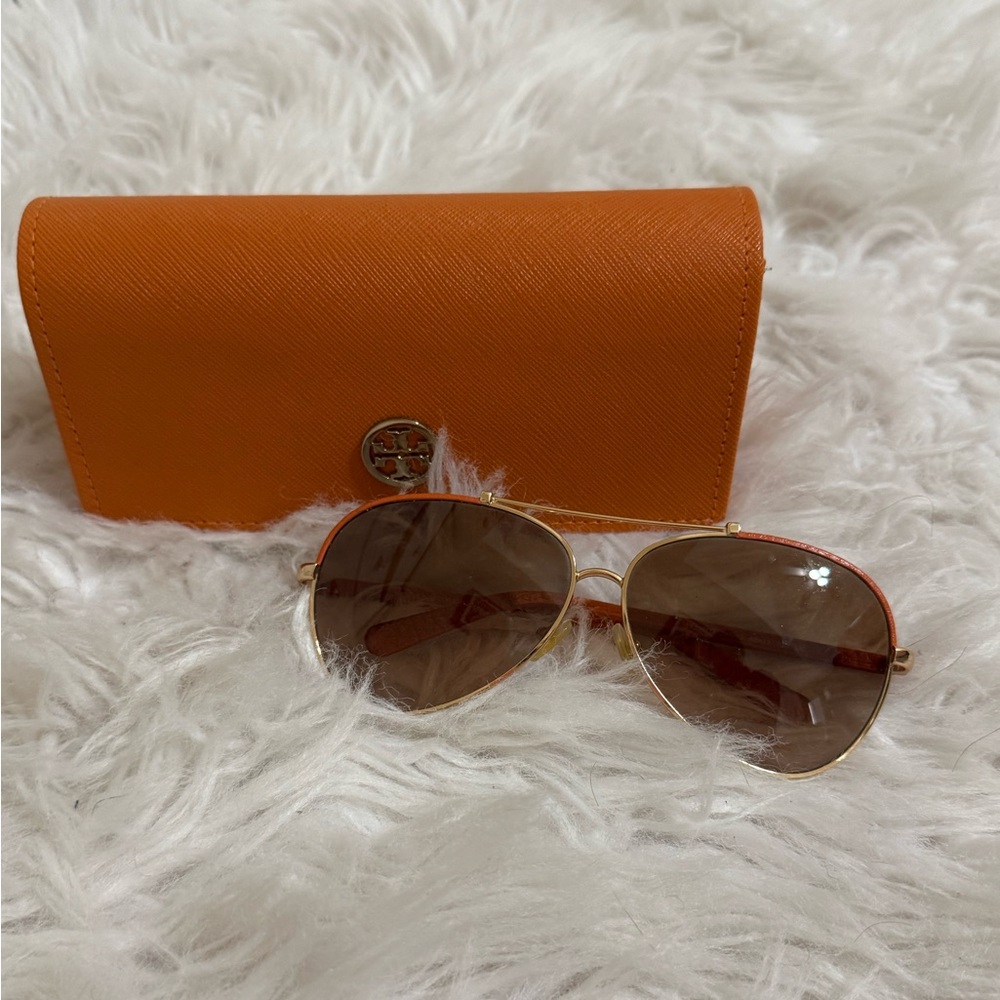 Orange Tory Burch sunglassess